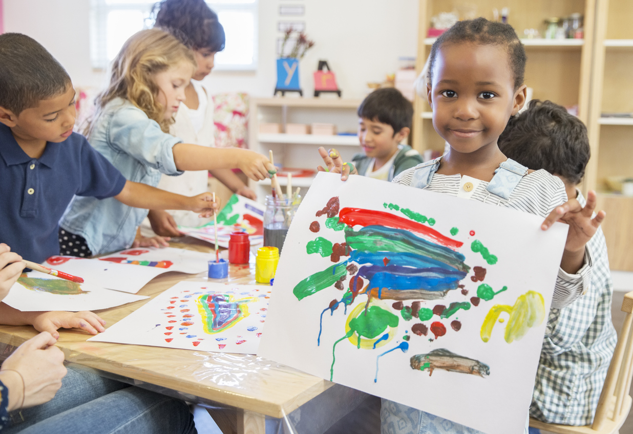 elementary children finger painting